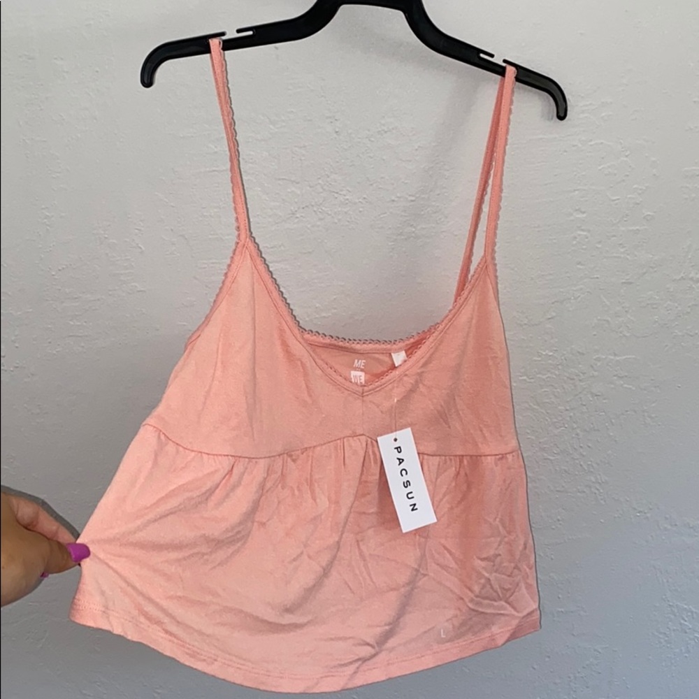 peachy pink loose shirt thing